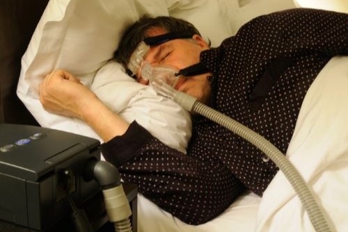 Man wearing ventilator