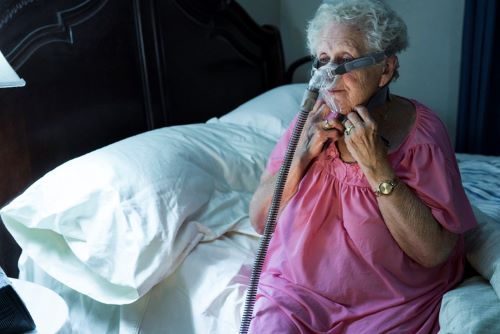Woman with CPAP Machine
